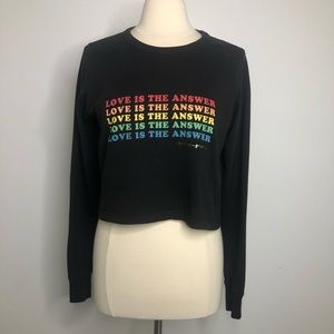 Spiritual Gangster black long sleeve cropped top, “love is the answer”